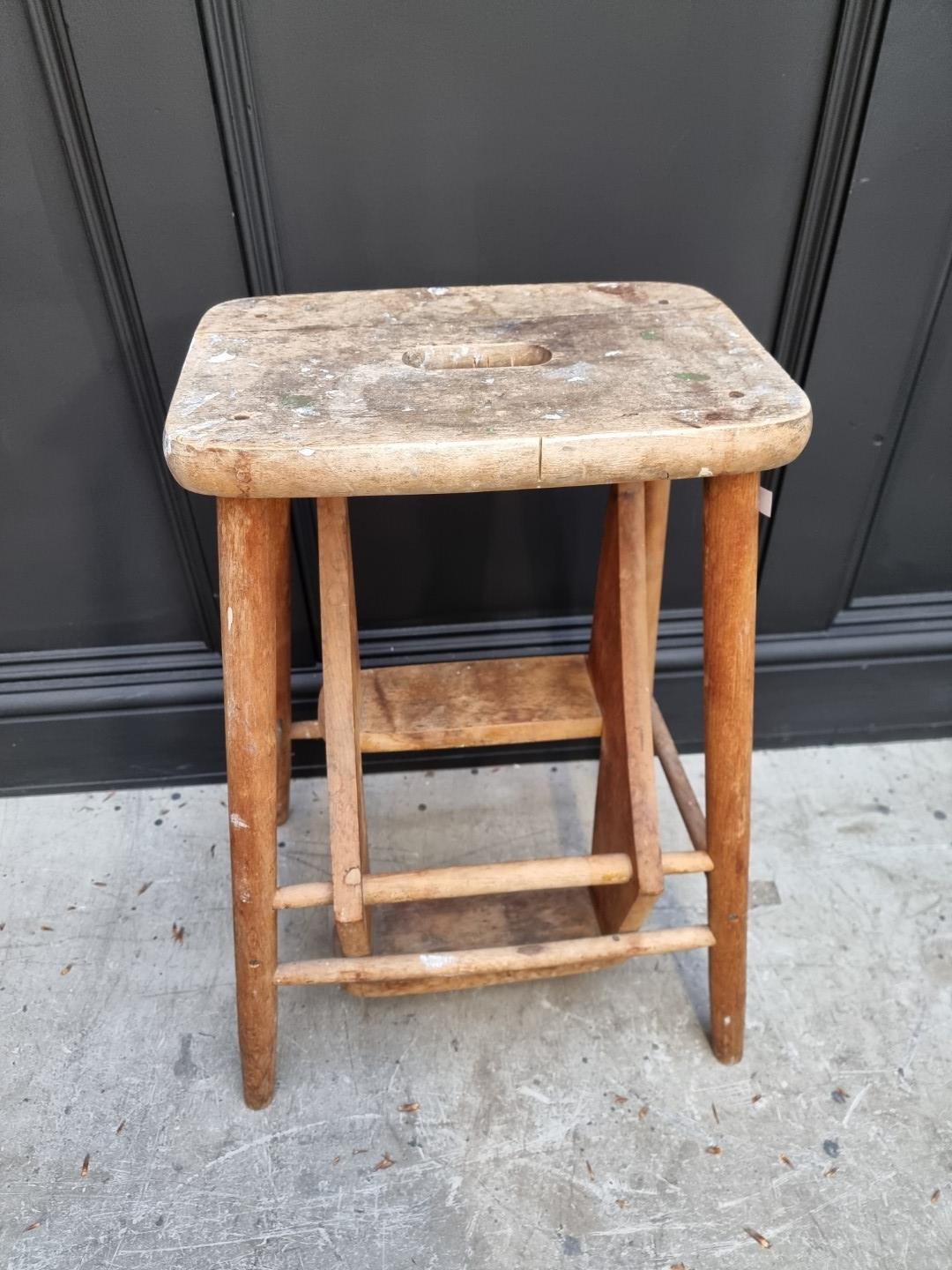 A beech metamorphic stool.