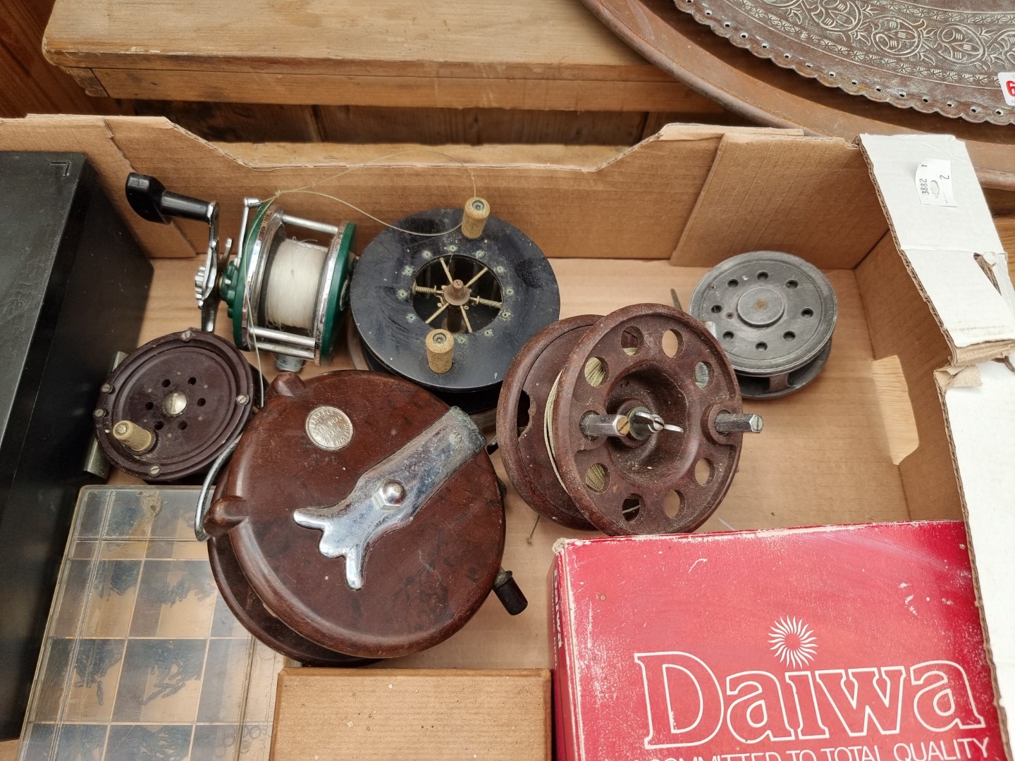 Angling: a small collection of fishing reels and related. - Image 2 of 2