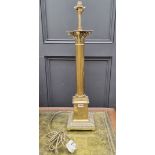 A large brass Corinthian column table lamp, total height 73cm.