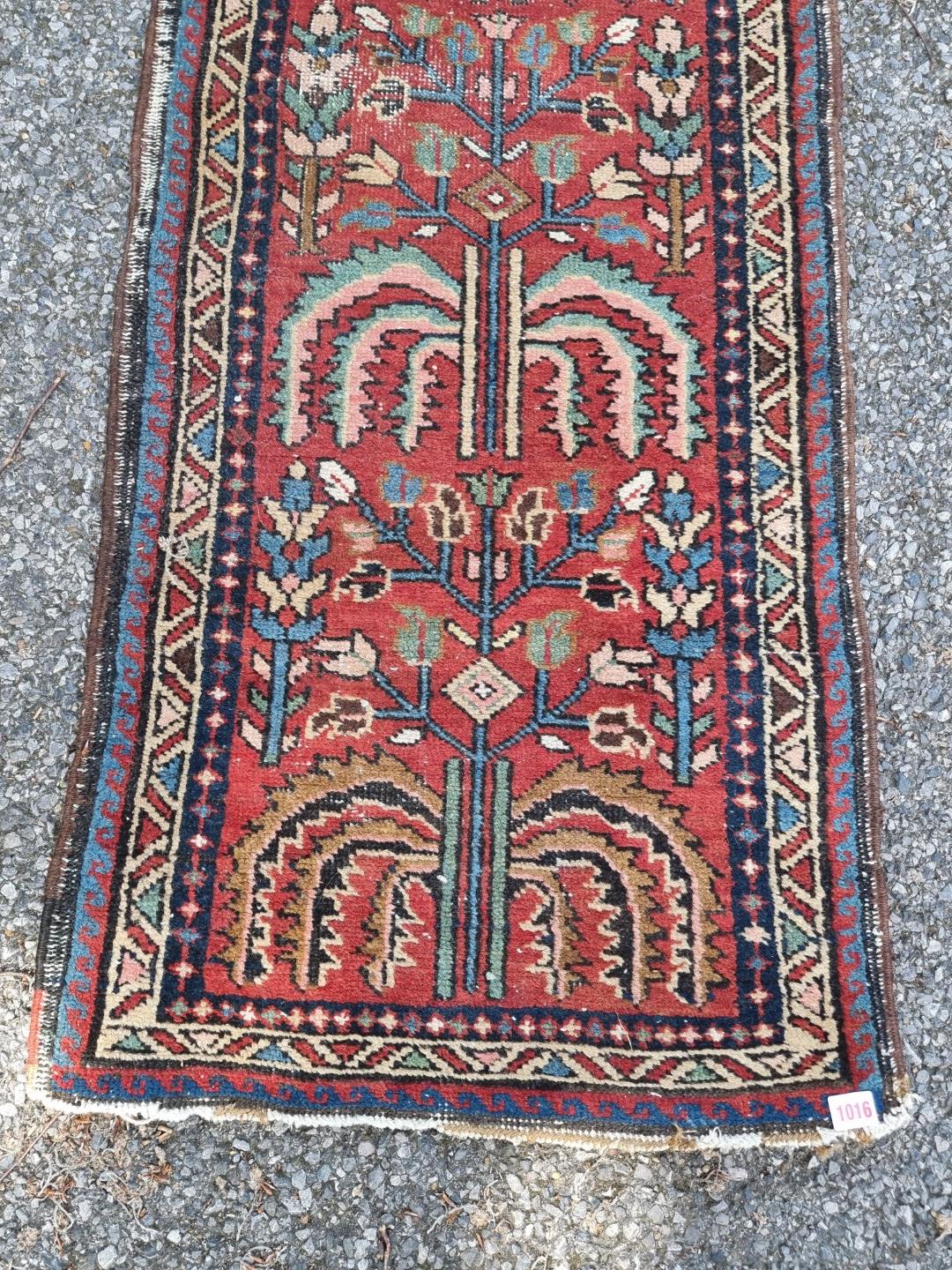 A Persian runner, having tree design to central field, with geometric borders, 277 x 60cm; - Image 2 of 8