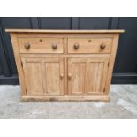 An old pine side cabinet, 128cm wide.