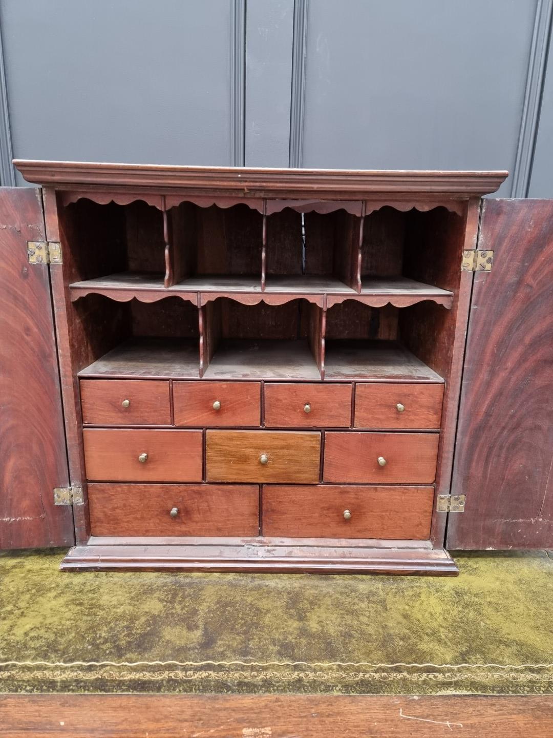 An 18th century mahogany table cabinet, enclosing pigeonholes and small drawers, 61cm high x 64. - Image 8 of 9