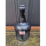 A Georgian glass mallet form wine bottle, 21cm high.