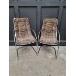 A pair of Willy Rizzo style chrome armchairs.
