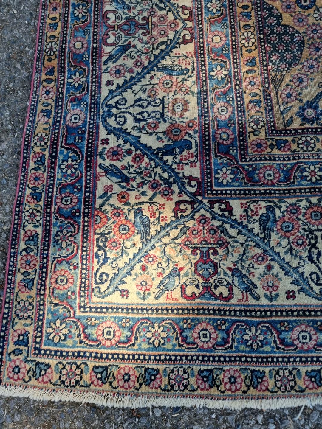 A large Persian rug, having central floral urn, with floral scrolls to side, borders decorated - Image 9 of 20