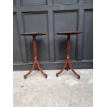 A pair of Regency style mahogany octagonal tripod tables, 42.5cm wide.