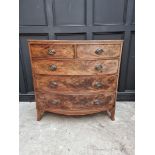 An early 19th century figured mahogany bowfront chest of drawers, 107.5cm wide.