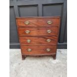 A George III mahogany and crossbanded bowfront four drawer chest, 78cm wide.