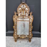 A late 18th century French gilt framed wall mirror, 107.5cm x 55cm.