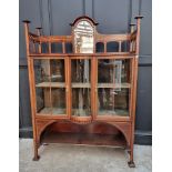 A good circa 1900 mahogany and inlaid display cabinet, with bowfront centre and platform
