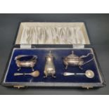 A cased silver three piece cruet set, by A Chick & Sons Ltd, London 1976, 131g.