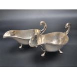 A pair of silver sauce boats, by Viners, Sheffield 1960, 19cm long, 580g.