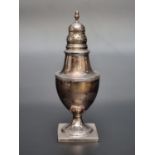 A George III silver sugar caster, by S ?, London 1806, 16cm high, weighted.