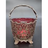 A Victorian pierced silver swing handled sugar basket, by Creswick & Co., Sheffield 1863, 9.5cm high