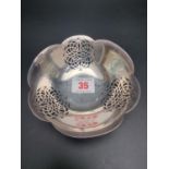 A pierced silver bonbon bowl, by Asprey & Co. Ltd, Sheffield 1996, 12.5cm diameter, 150g.