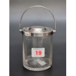 A silver mounted glass condiment jar, by Hukin & Heath, Birmingham 1936, 10cm high excluding handle.