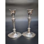 A pair of Edwardian silver candlesticks, by The Goldsmiths & Silversmiths Co. Ltd, London 1902, 24cm