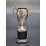 A small silver twin handled trophy cup, by William Neale & Son Ltd, Birmingham 1937, 10.5cm, 53g.