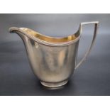 A George III silver milk jug, by John Emes, London 1805, 9.5cm high, 127g.