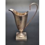 A George III silver milk jug, probably Hester Bateman, London 1782, 13cm high, 108g.