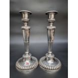 A pair of George III silver candlesticks, by John Roberts & Co., Sheffield 1811, 31.5cm high,