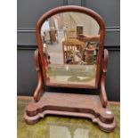 A Victorian mahogany toilet mirror, 53.5cm wide.