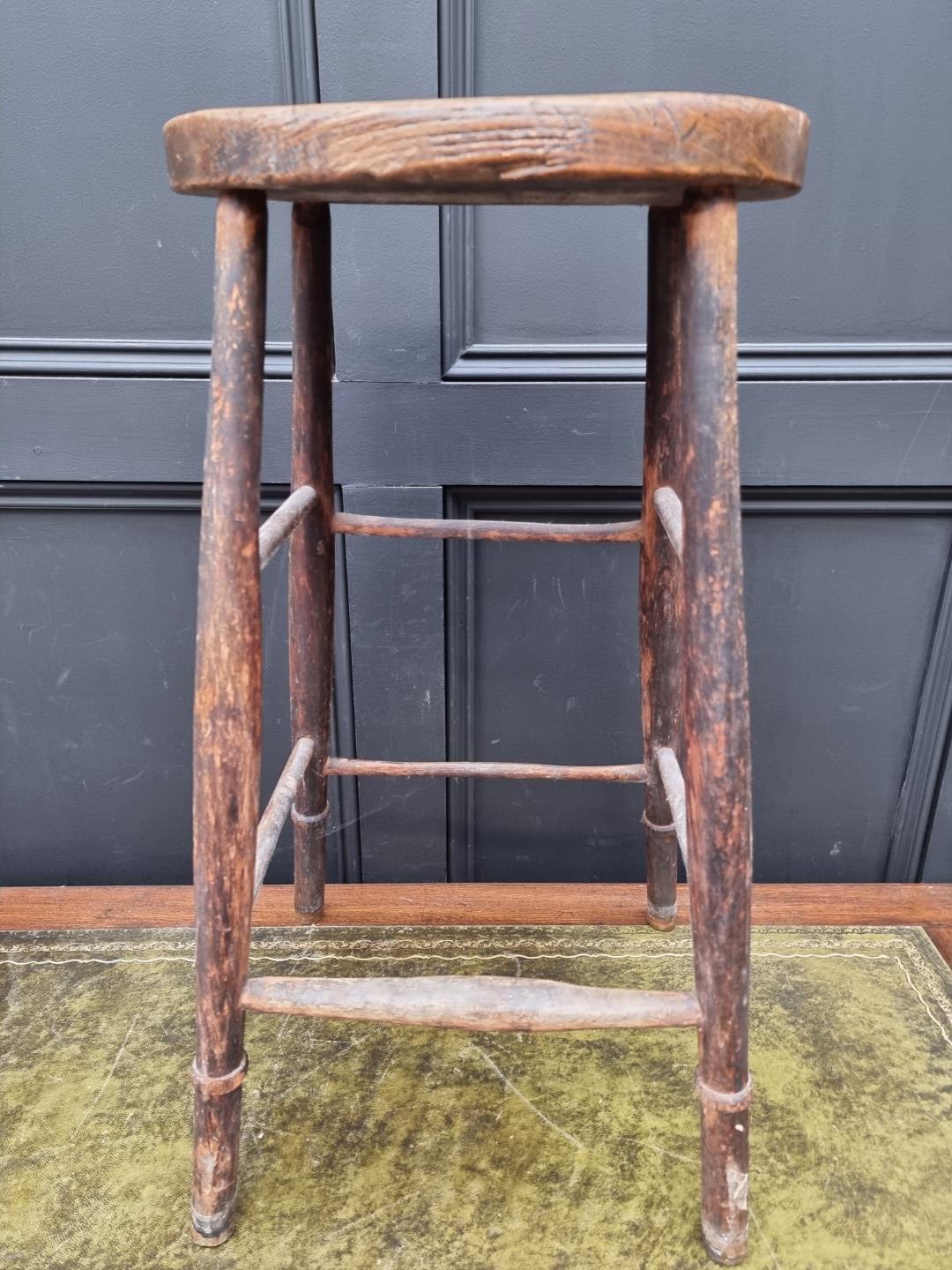 An old elm top high stool, 69cm high. - Image 4 of 5