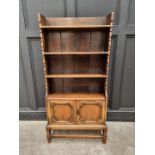 A small 1920s oak bookcase, 65cm wide.