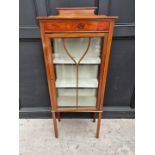 A small Edwardian mahogany, line inlaid and painted display cabinet, 59cm wide.