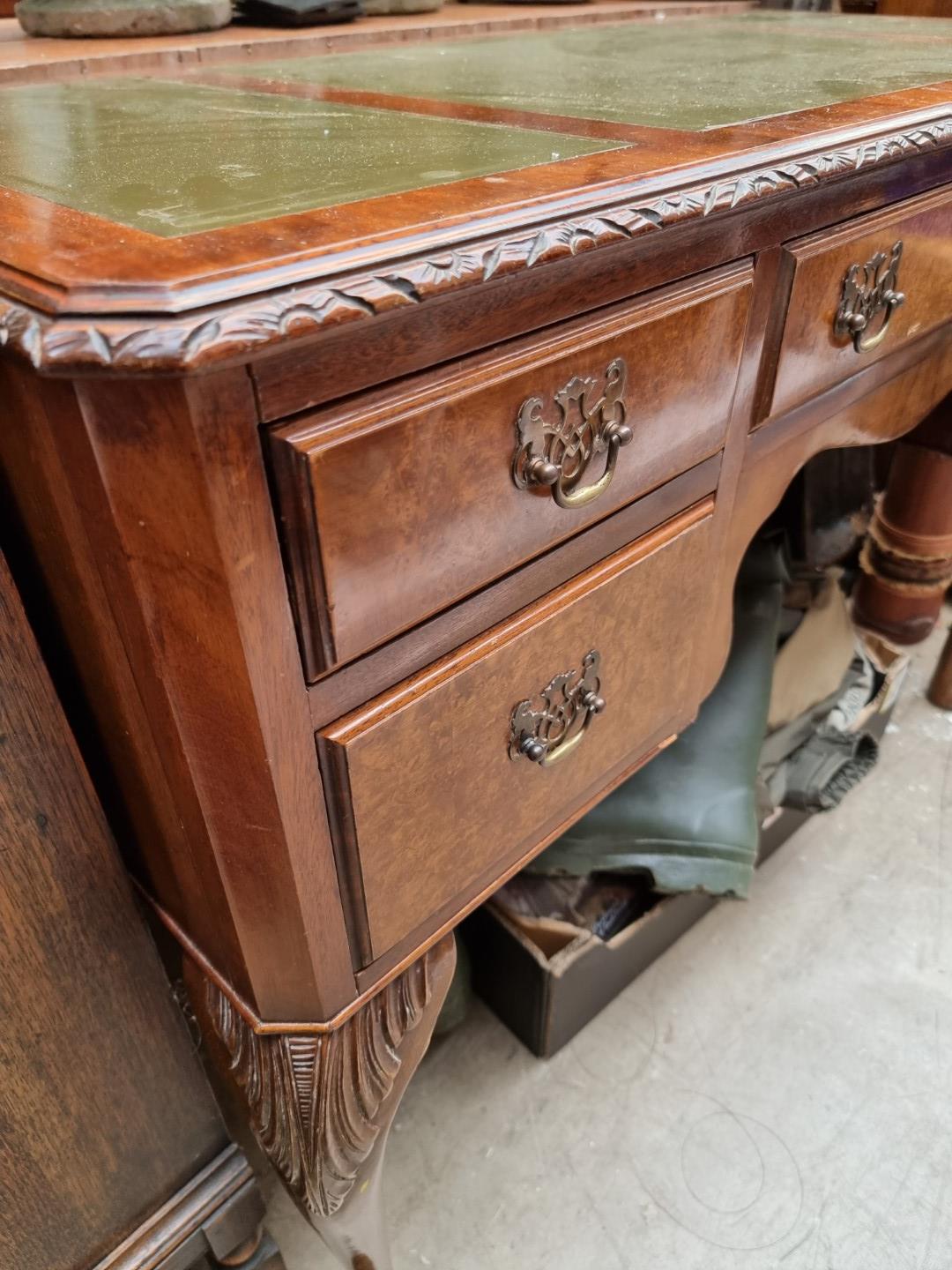 A 1930s walnut kneehole desk, 107cm wide. - Image 2 of 8
