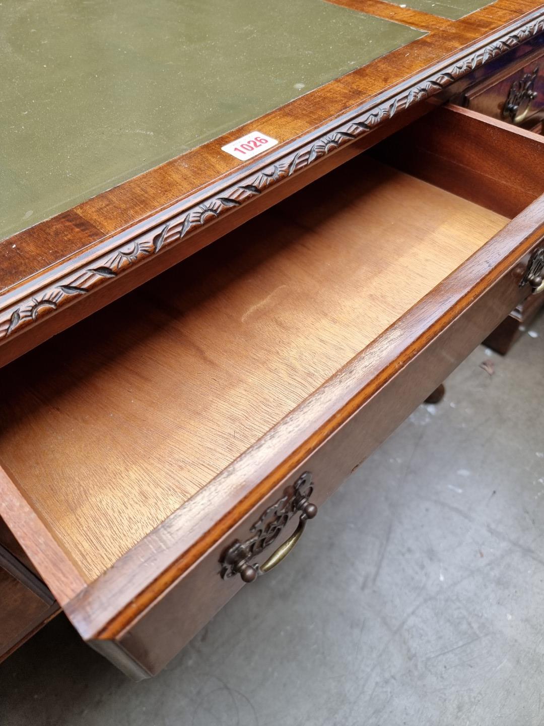 A 1930s walnut kneehole desk, 107cm wide. - Image 6 of 8