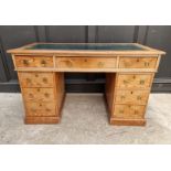 A 19th century pine pedestal desk, 119.5cm wide.