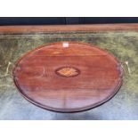 An Edwardian mahogany, satinwood and inlaid oval tray, 59.5cm wide.