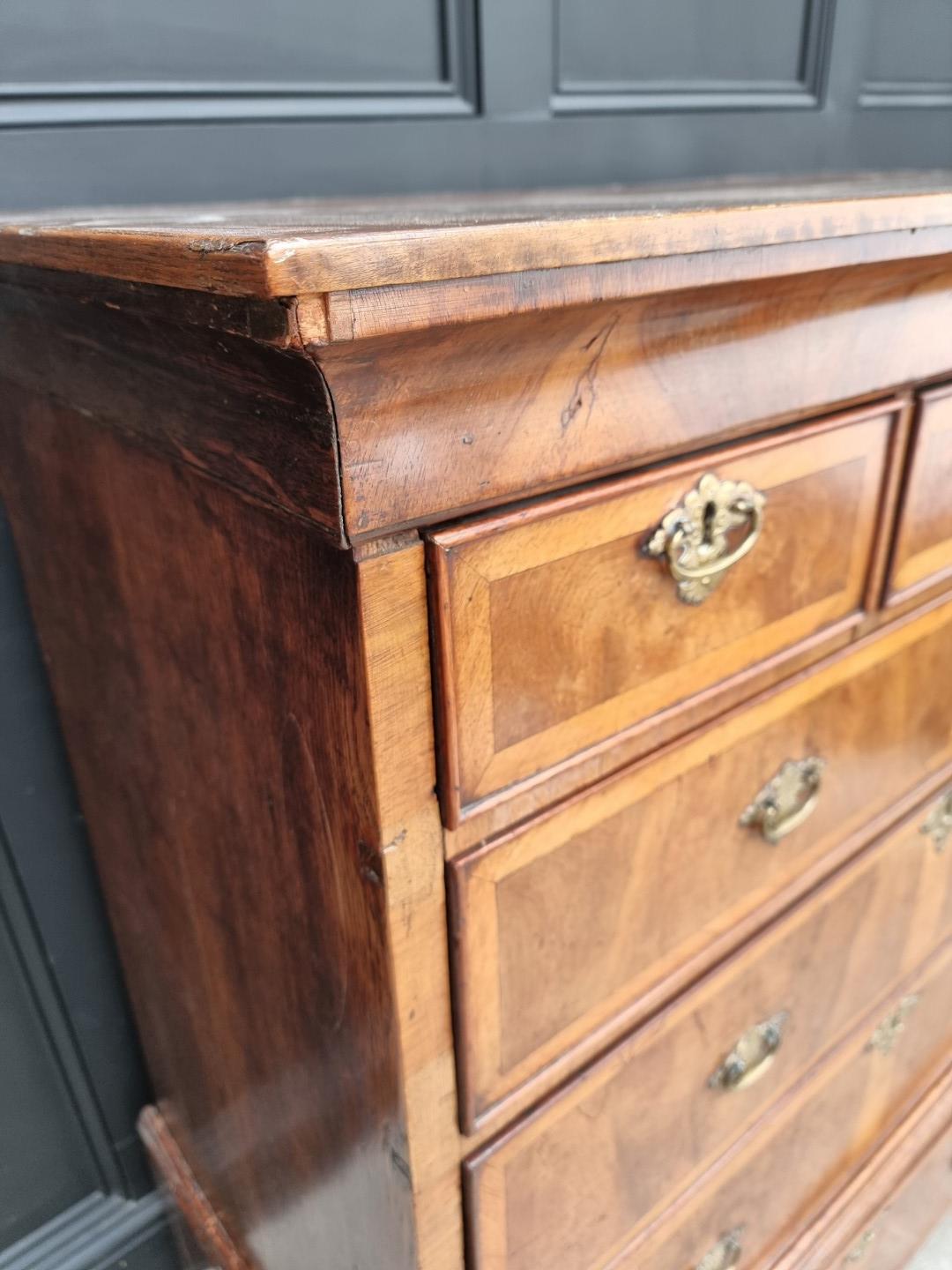 A George II walnut and crossbanded chest on stand, 105.5cm wide, (lacking legs). - Image 6 of 9