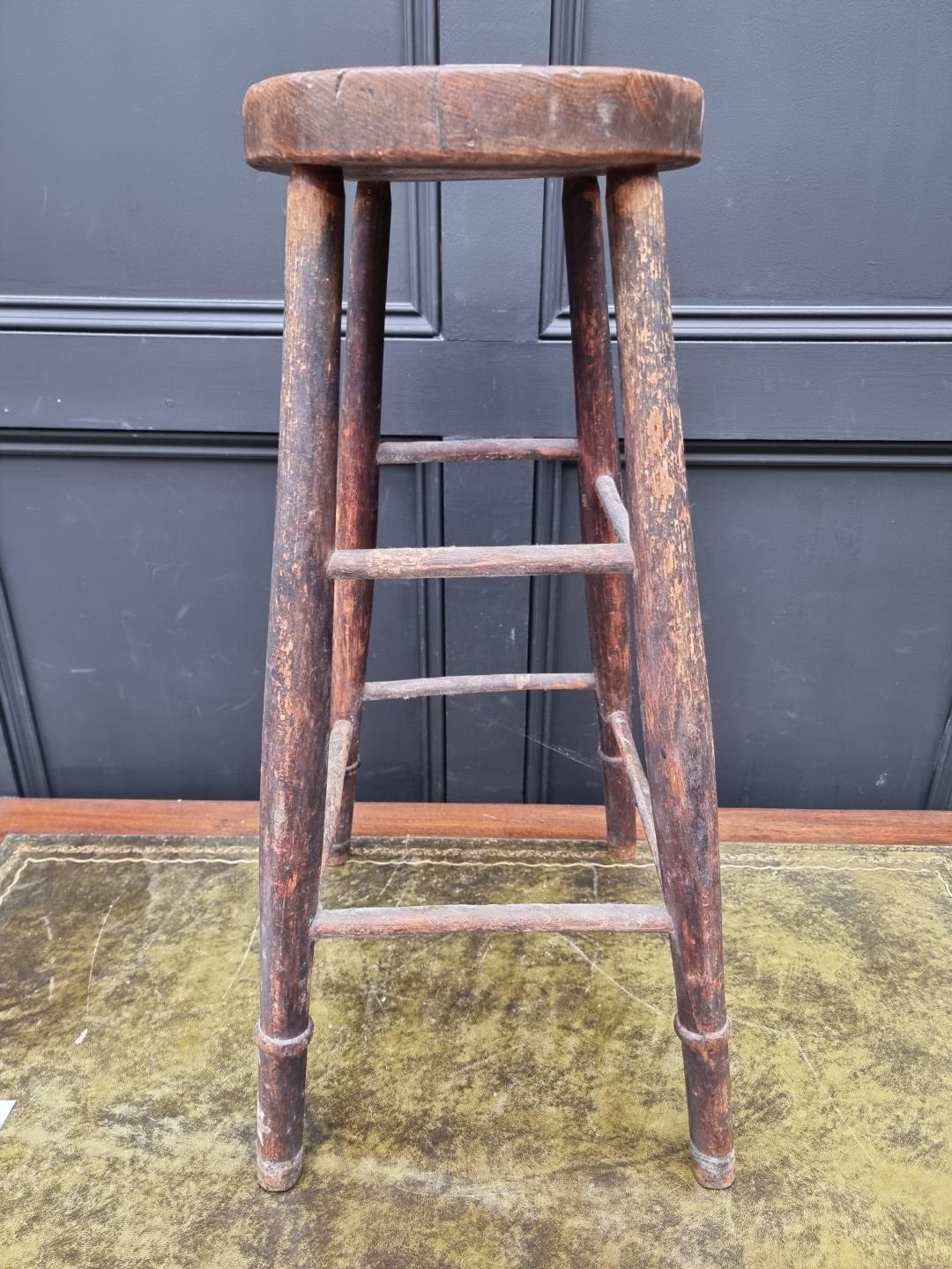 An old elm top high stool, 69cm high. - Image 3 of 5