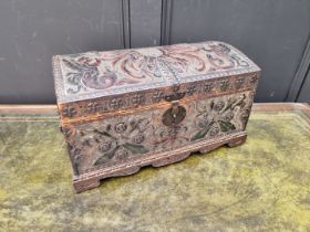 A small antique embossed leather and brass dome top casket, 44.5cm wide.