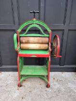 A Victorian green and red painted mangle, by 'H J & E A Boolds Ltd, Devonport', 154cm high.