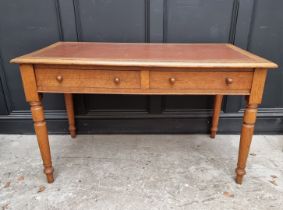 A Victorian oak two drawer desk, 122.5cm wide.