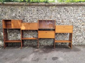 A vintage Ladderax five bay modular shelving unit.