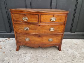 An early 19th century mahogany bowfront chest, of two short and two long drawers, 91cm wide.