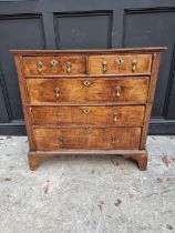 An 18th century oak and walnut chest of drawers, 93cm wide, (in two parts).