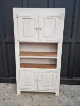 A white painted oak side cabinet, 97.5cm wide.