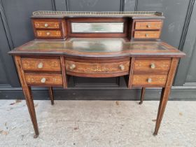 A late 19th century rosewood and inlaid bonheur du jour, 106cm wide.