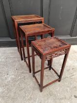 A nest of three antique Chinese hardwood occasional tables, largest 37.5cm wide.