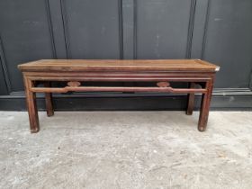 An antique Chinese hardwood alter style table, 133.5cm wide, (probably reduced in height).