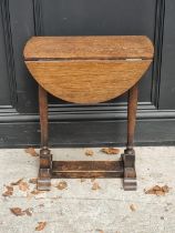 A small 19th century oak drop leaf table, 53.5cm wide when open.