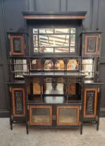 A large and impressive Aesthetic ebonized and amboyna mirror back side cabinet, 168.5cm wide.