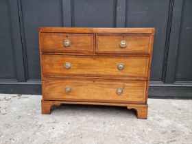 A George III mahogany and crossbanded chest, of two short and two long drawers, 91cm wide.