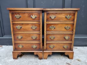 A pair of small reproduction walnut bedside chests, 37cm wide.