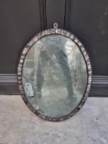 An Irish style oval wall mirror, 59 x 44.5cm.